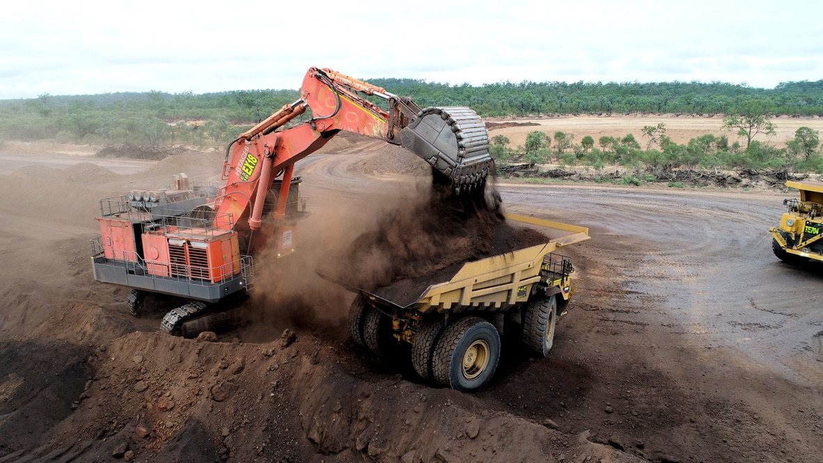 Excavator loading haul truck